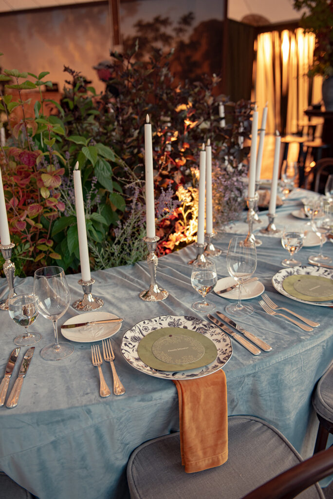 fall woodland orchard wedding table setting with matte black plates